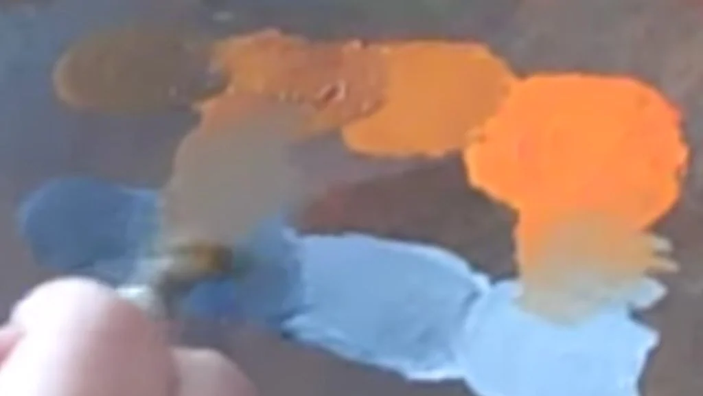 Grey mixed into the orange to dull it into a muted, brownish orange